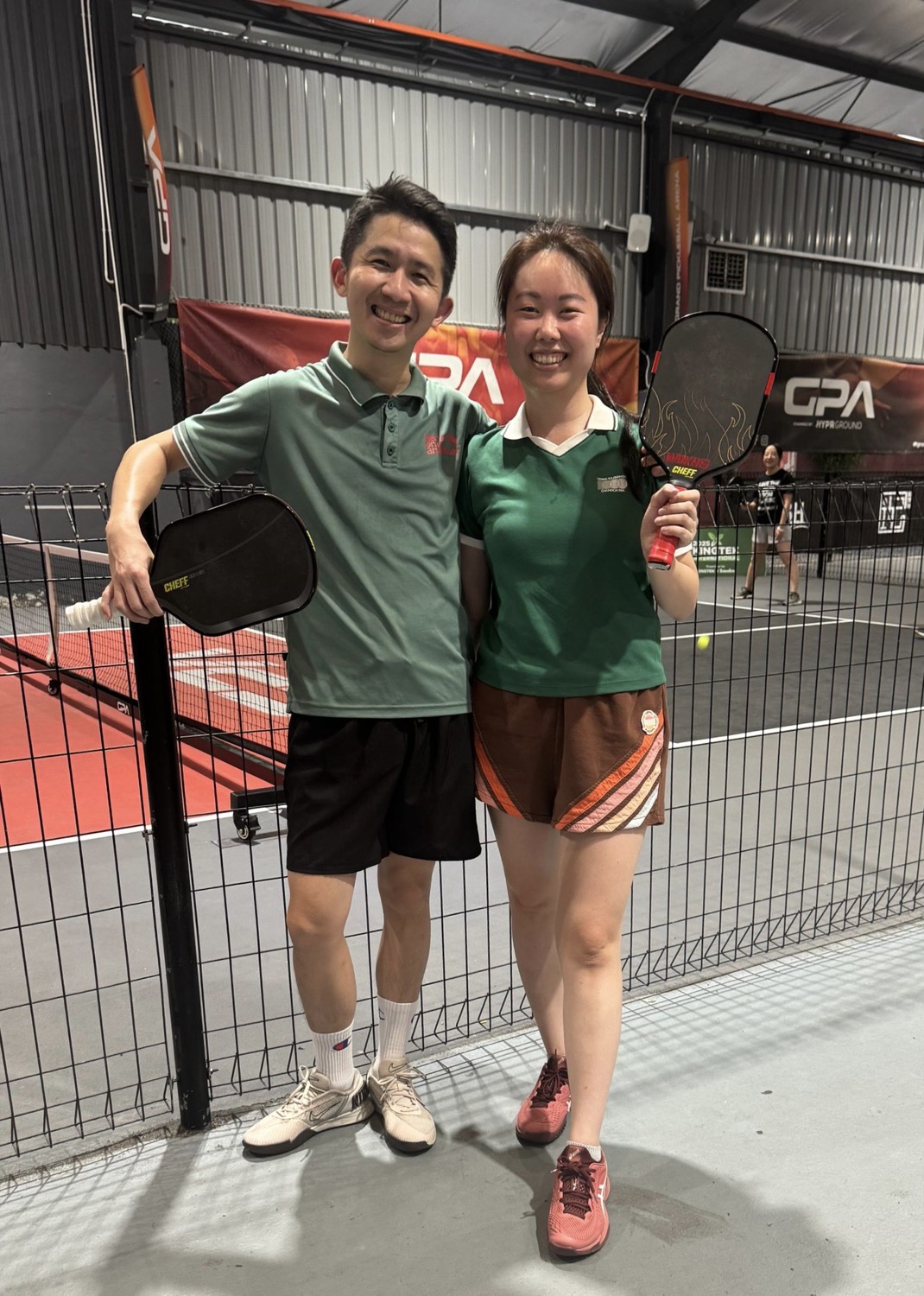 Vin Lim and partner on court with CHEFF paddles
