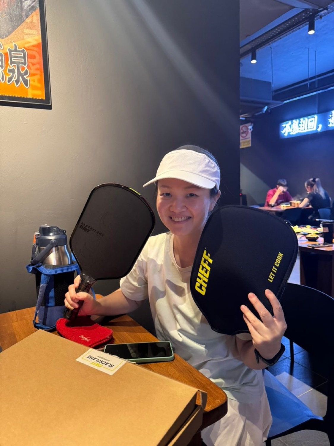 Jaq Tan with CHEFF paddles at the club